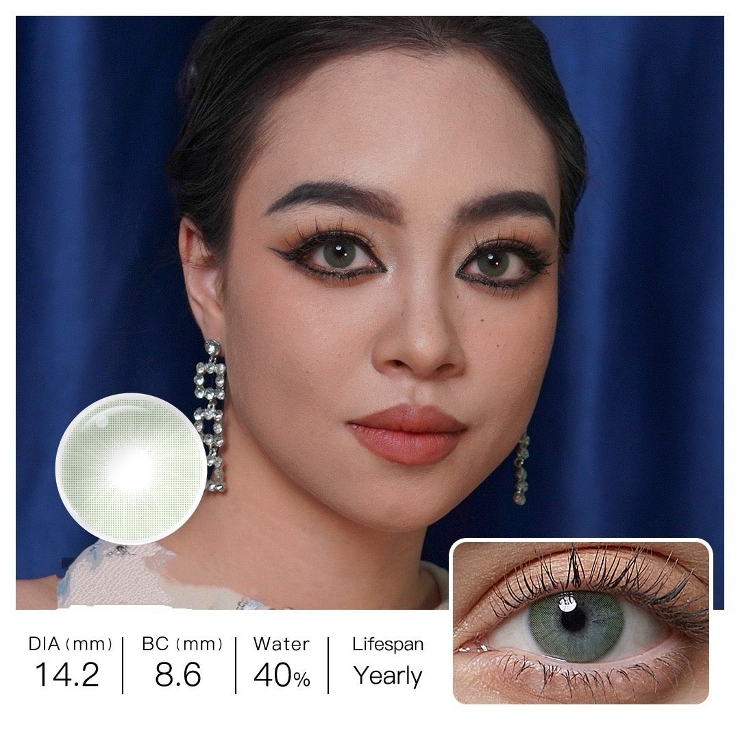 Model wearing Ocean green contacts for a luminous eye transformation on dark and light eyes