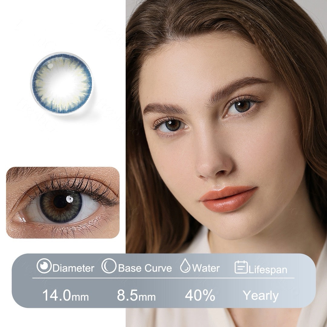 Contact lenses with a blue outer ring and yellowish green center, featuring Fusion Technology for a soft, natural gradient and all-day comfort